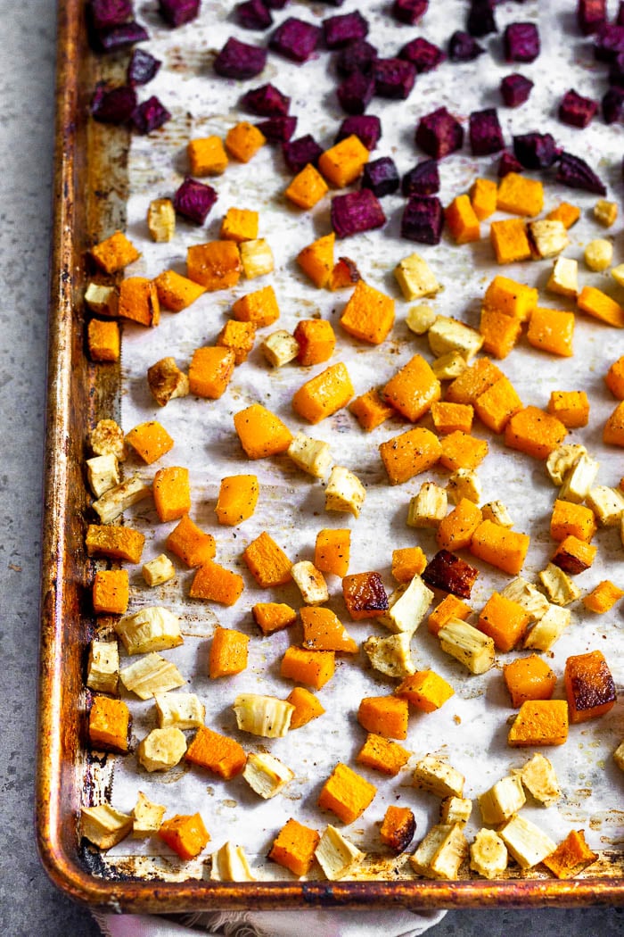 Pan of roasted butternut squash, parsnips, and beets.