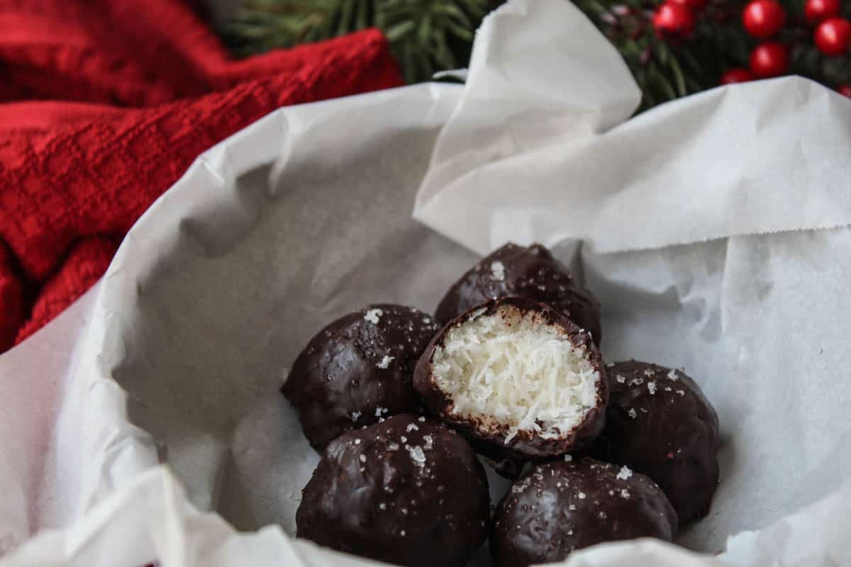 Chocolate Covered Peppermint Macaroons made from only 4 healthy ingredients that taste like a homemade peppermint patty. Vegan, paleo, gluten and dairy free!