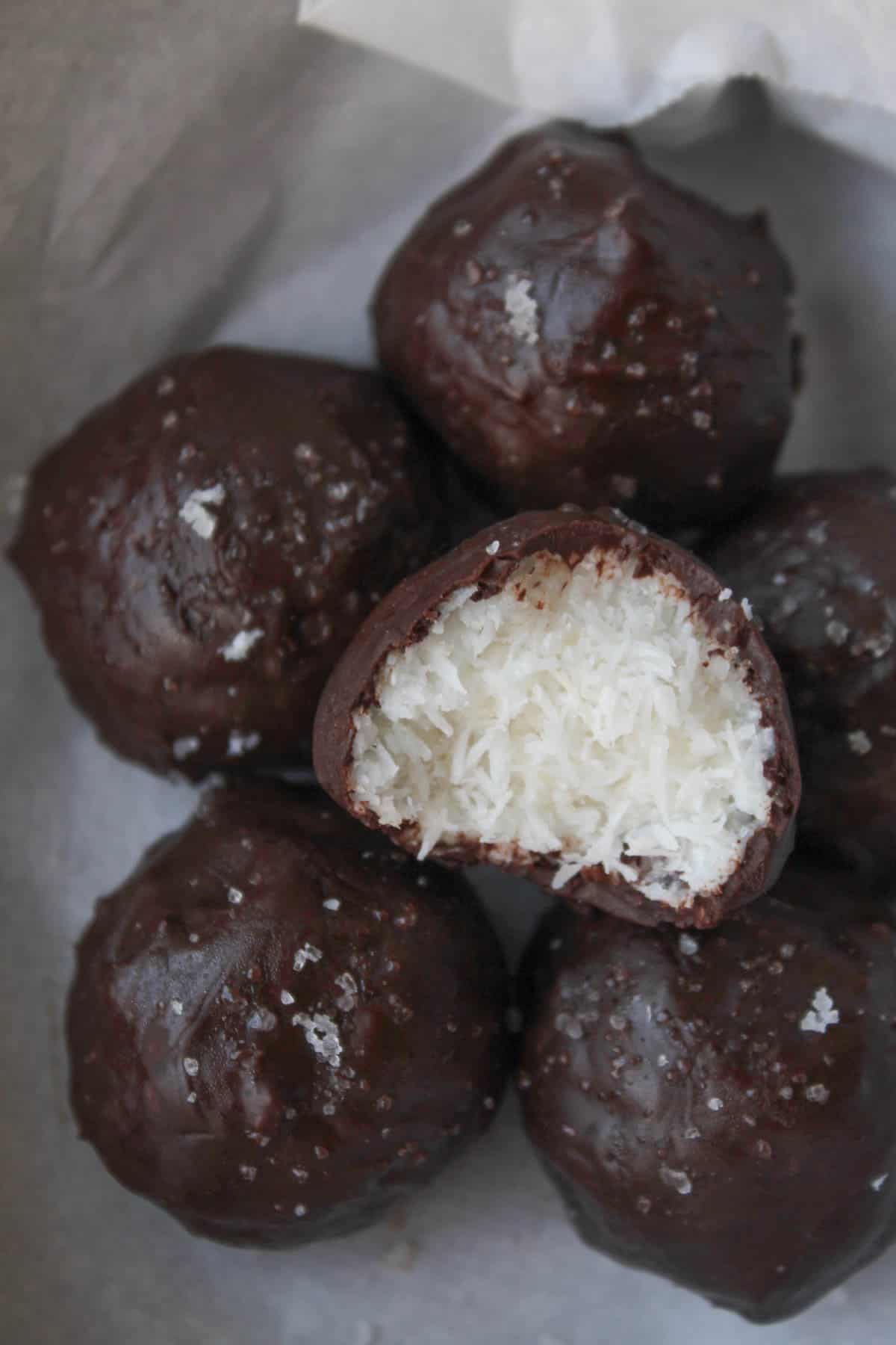 Chocolate Covered Peppermint Macaroons made from only 4 healthy ingredients that taste like a homemade peppermint patty. Vegan, paleo, gluten and dairy free!