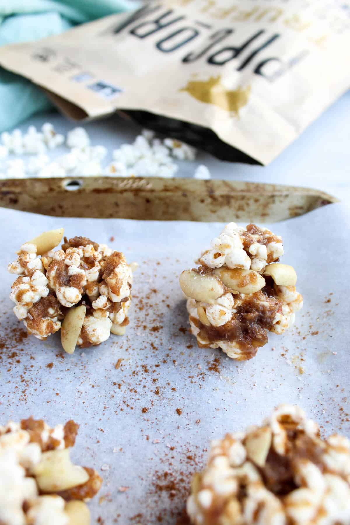 No bake and 30 minutes to make, these Peanut Butter Caramel Popcorn Balls are the perfect holiday snack. No added sweetener, vegan, and gluten free! - Eat the Gains
