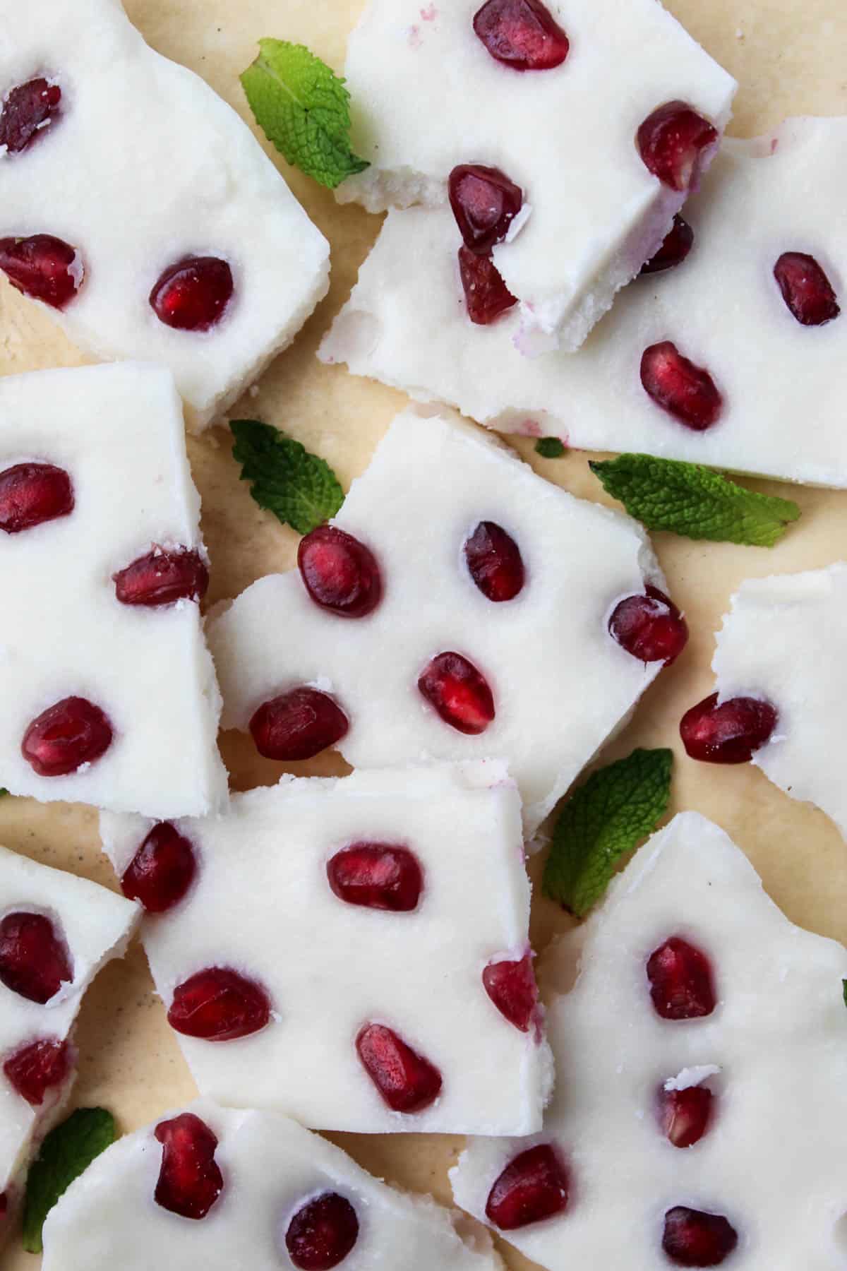 Four ingredients make this paleo & vegan Pomegranate Peppermint Coconut Bark, a perfect healthy treat for the holidays or a great homemade gift to give - Eat the Gains