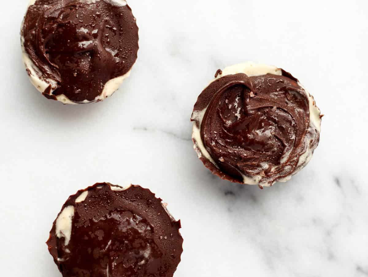 These two ingredient Vegan Salted Caramel Ice Cream Cups make an easy, dairy free, and gluten free frozen dessert perfect for entertaining or a sweet treat - Eat the Gains