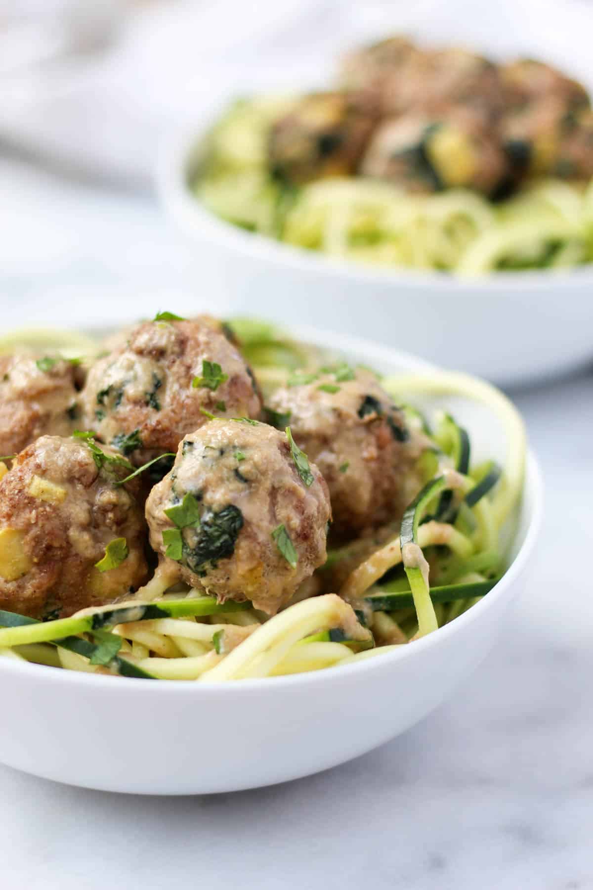 Protein, veggies, and fruit packed, these Turkey, Kale, & Apple Meatballs come together in less than 30 minutes and are paleo, gluten free, and Whole30 compliant! - Eat the Gains