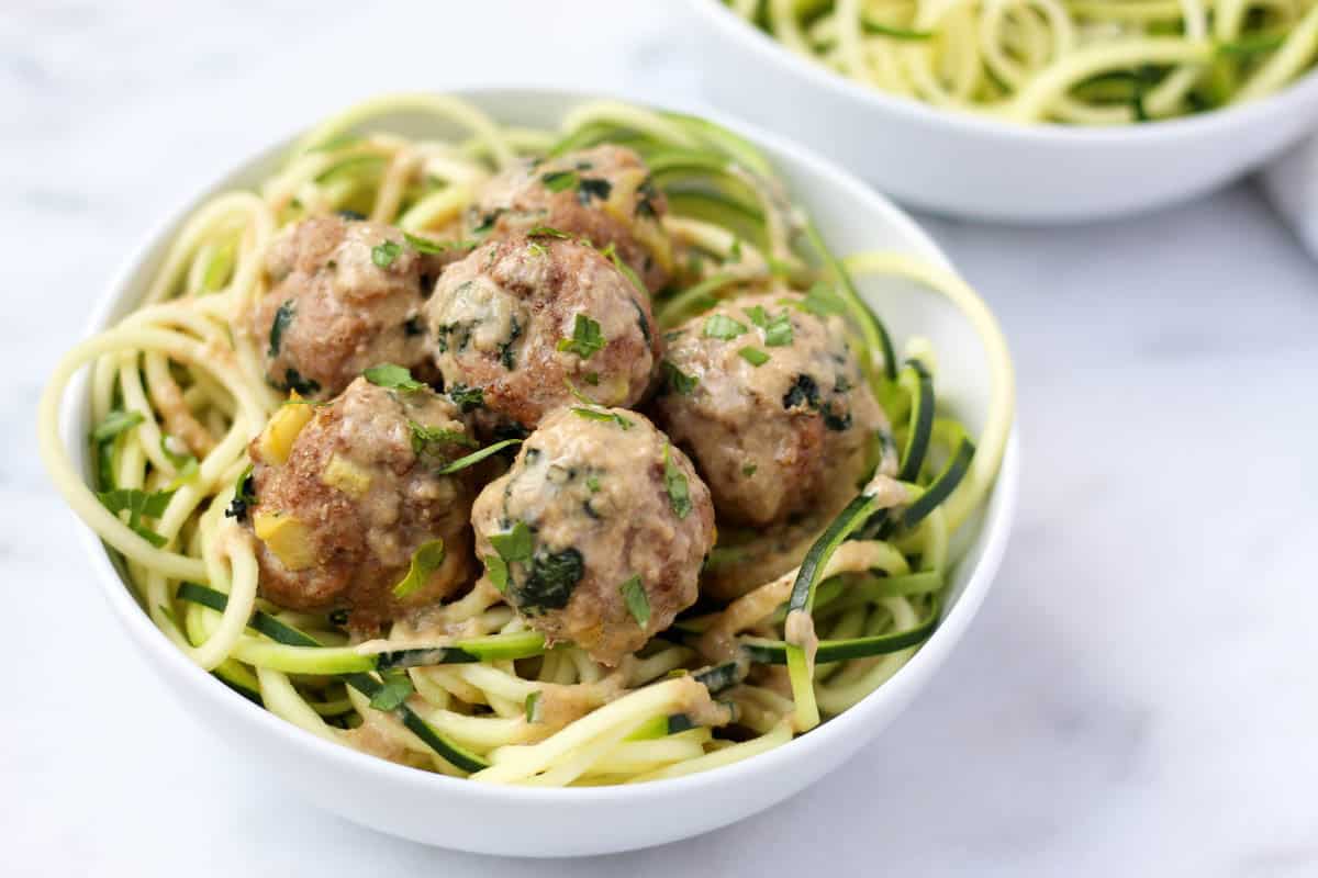 Protein, veggies, and fruit packed, these Turkey, Kale, & Apple Meatballs come together in less than 30 minutes and are paleo, gluten free, and Whole30 compliant! - Eat the Gains