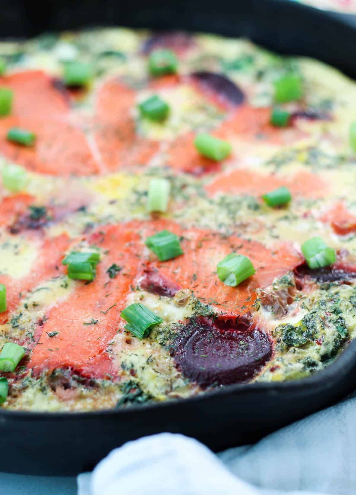 An easy and nutrient packed breakfast, this Beet & Smoked Salmon Frittata calls for one pan, less than 30 minutes, and is paleo, Whole30, and dairy free! - Eat the Gains