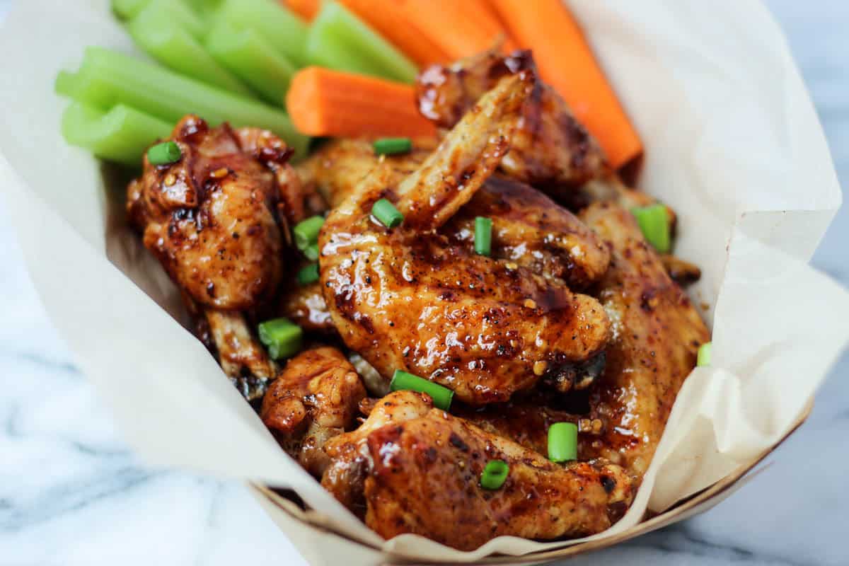 These paleo baked wings combine the perfect balance of sweet & spicy with a little kick from cold brew coffee. Made from good for you ingredients, they are paleo, gluten free, & dairy free - Eat the Gains