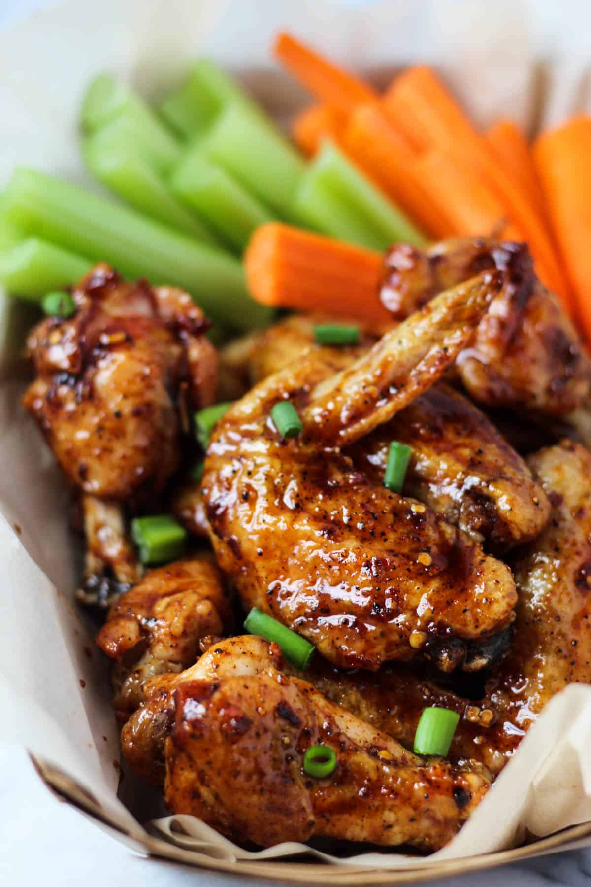 These paleo baked wings combine the perfect balance of sweet & spicy with a little kick from cold brew coffee. Made from good for you ingredients, they are paleo, gluten free, & dairy free - Eat the Gains