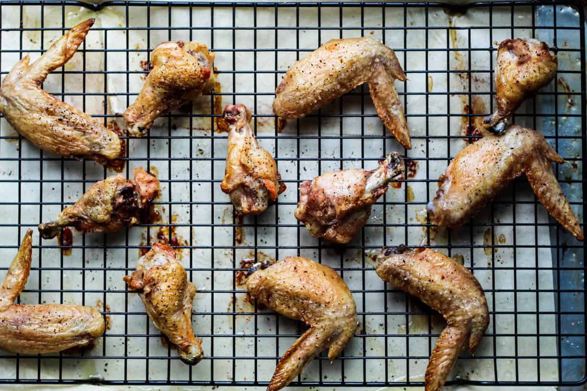 These paleo baked wings combine the perfect balance of sweet & spicy with a little kick from cold brew coffee. Made from good for you ingredients, they are paleo, gluten free, & dairy free - Eat the Gains