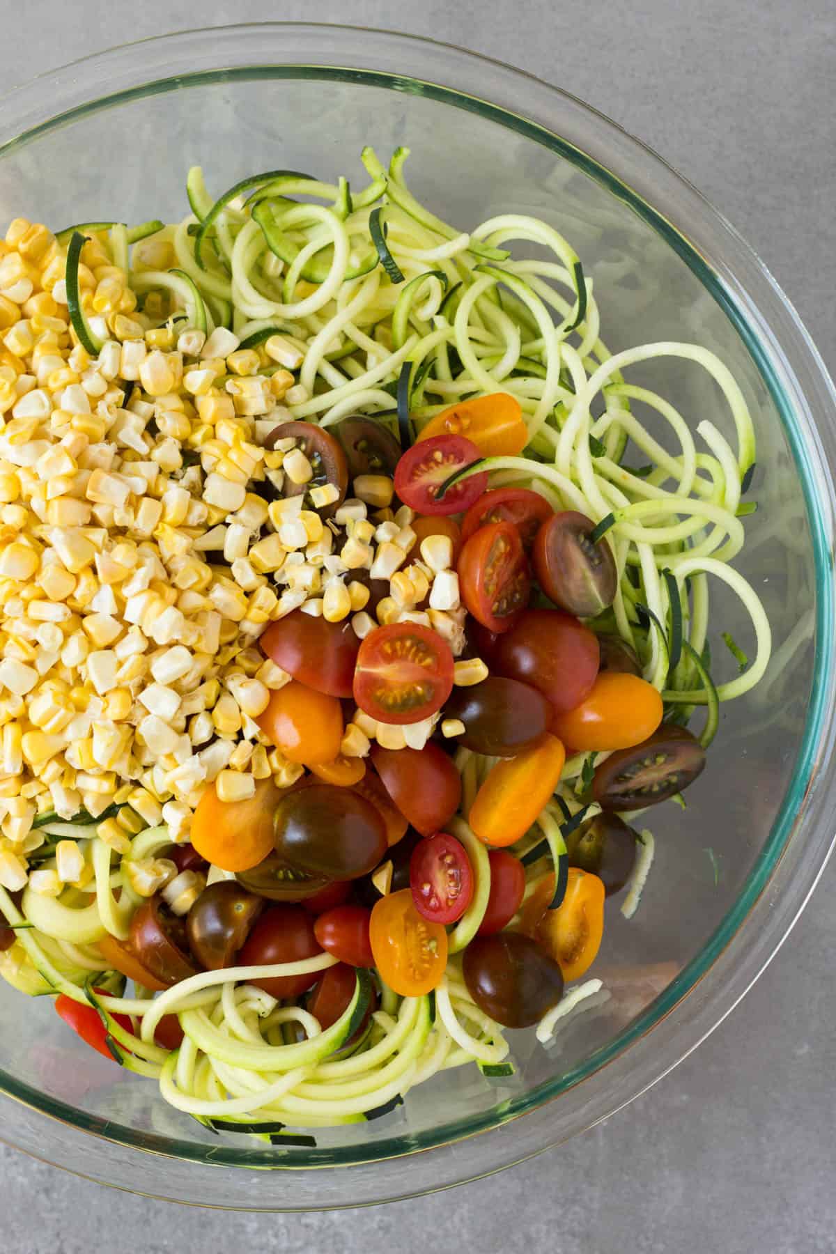 These Southwest Shrimp Zucchini Noodles are an easy and light summer dish packed with protein and seasonal vegetables. - Eat the Gains