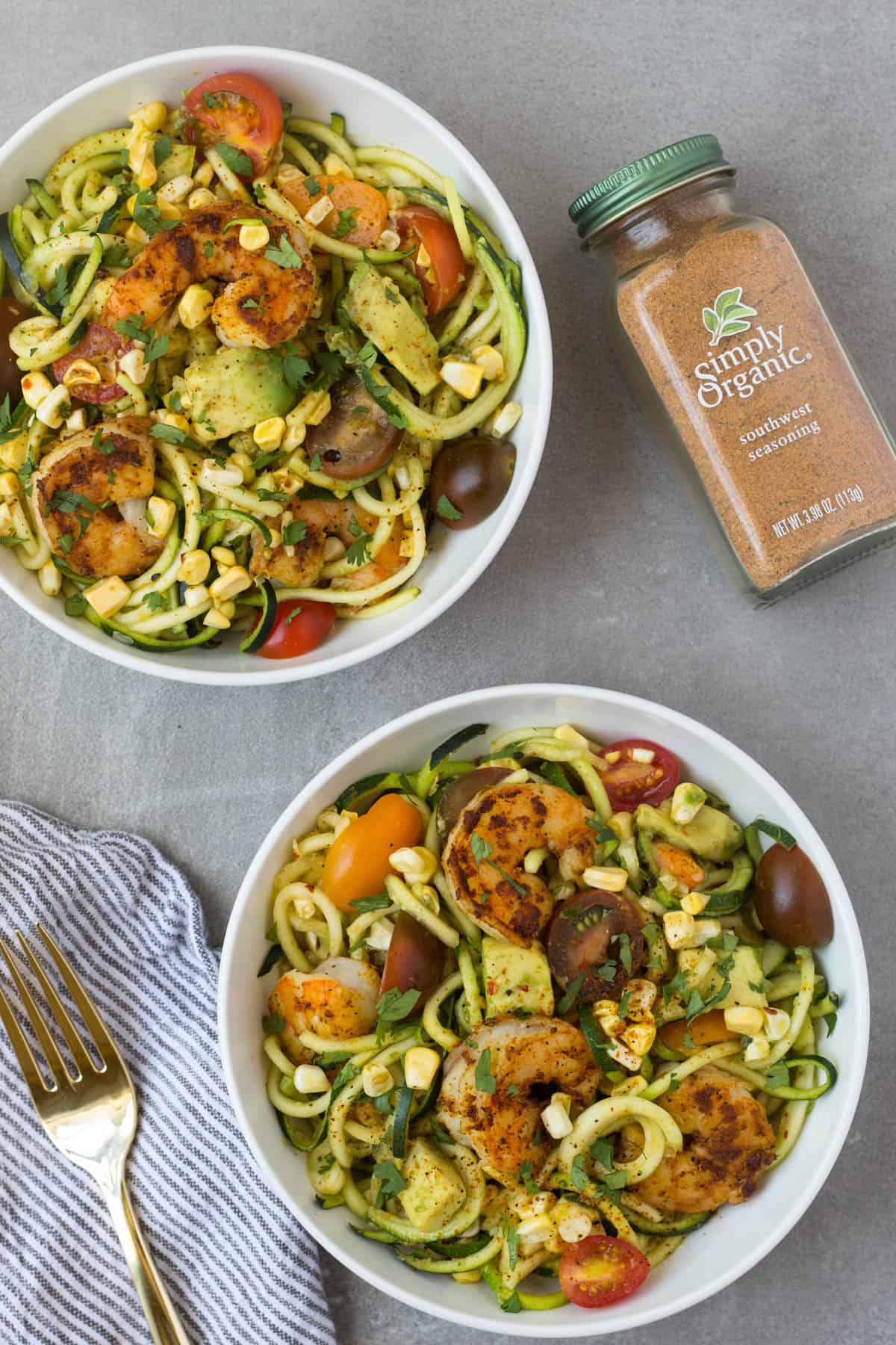 These Southwest Shrimp Zucchini Noodles are an easy and light summer dish packed with protein and seasonal vegetables. - Eat the Gains