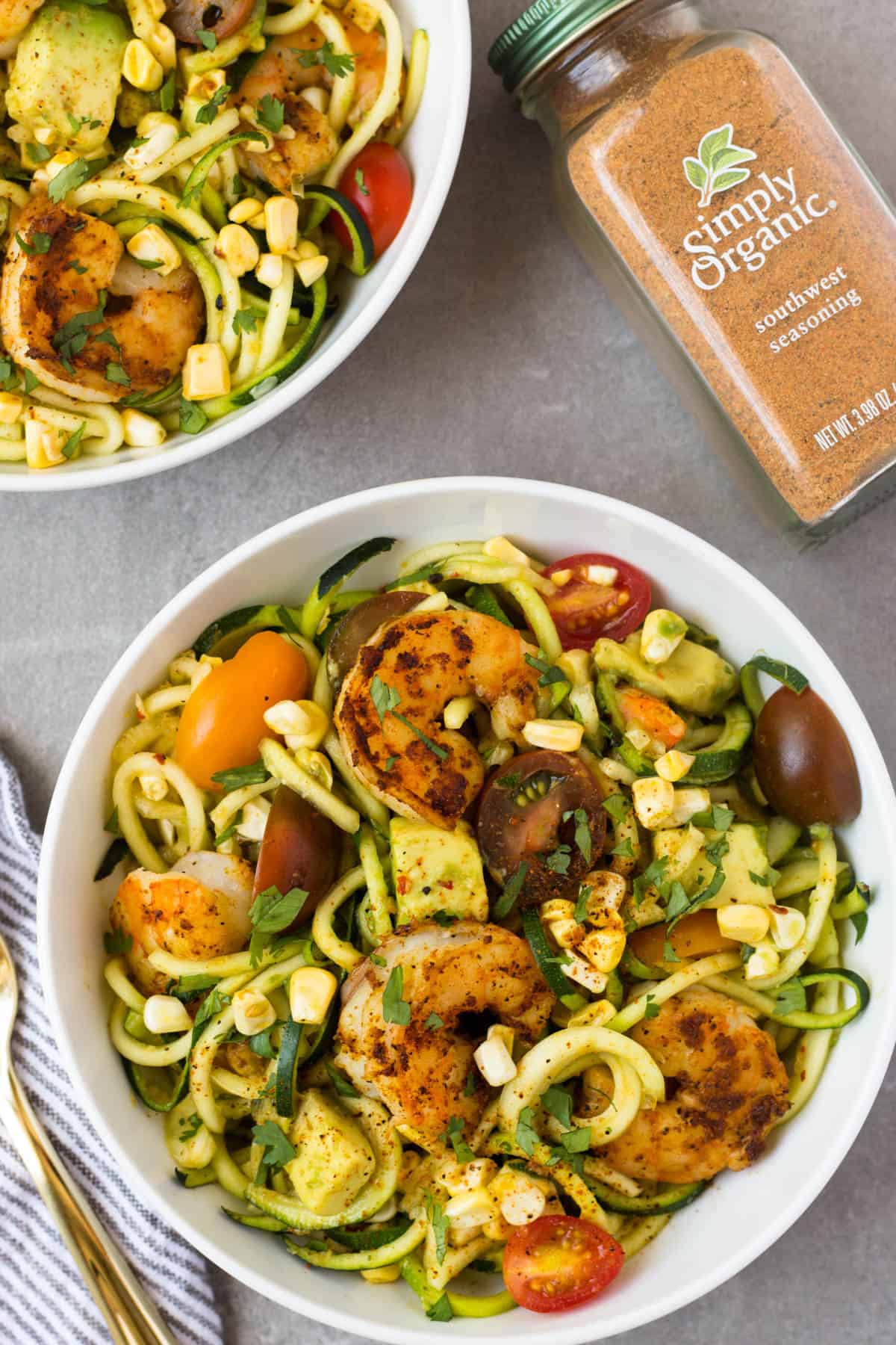 These Southwest Shrimp Zucchini Noodles are an easy and light summer dish packed with protein and seasonal vegetables. - Eat the Gains