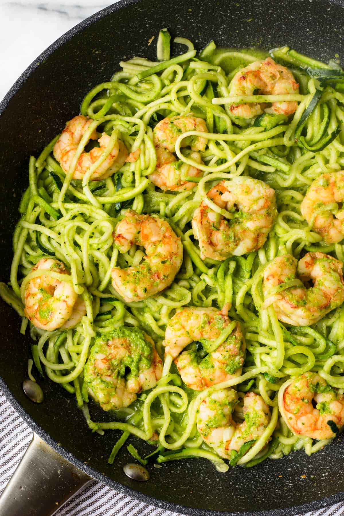 10 minutes + one pan is all you need for these Spicy Chimichurri Shrimp Zucchini Noodles! The easiest paleo, Whole30, and gluten free dinner for summer! - Eat the Gains