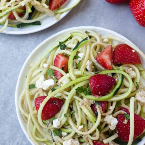 This Strawberry Zucchini Noodle Salad comes together in less than 10 minutes and makes a healthy, easy, and gluten free summertime dish - Eat the Gains