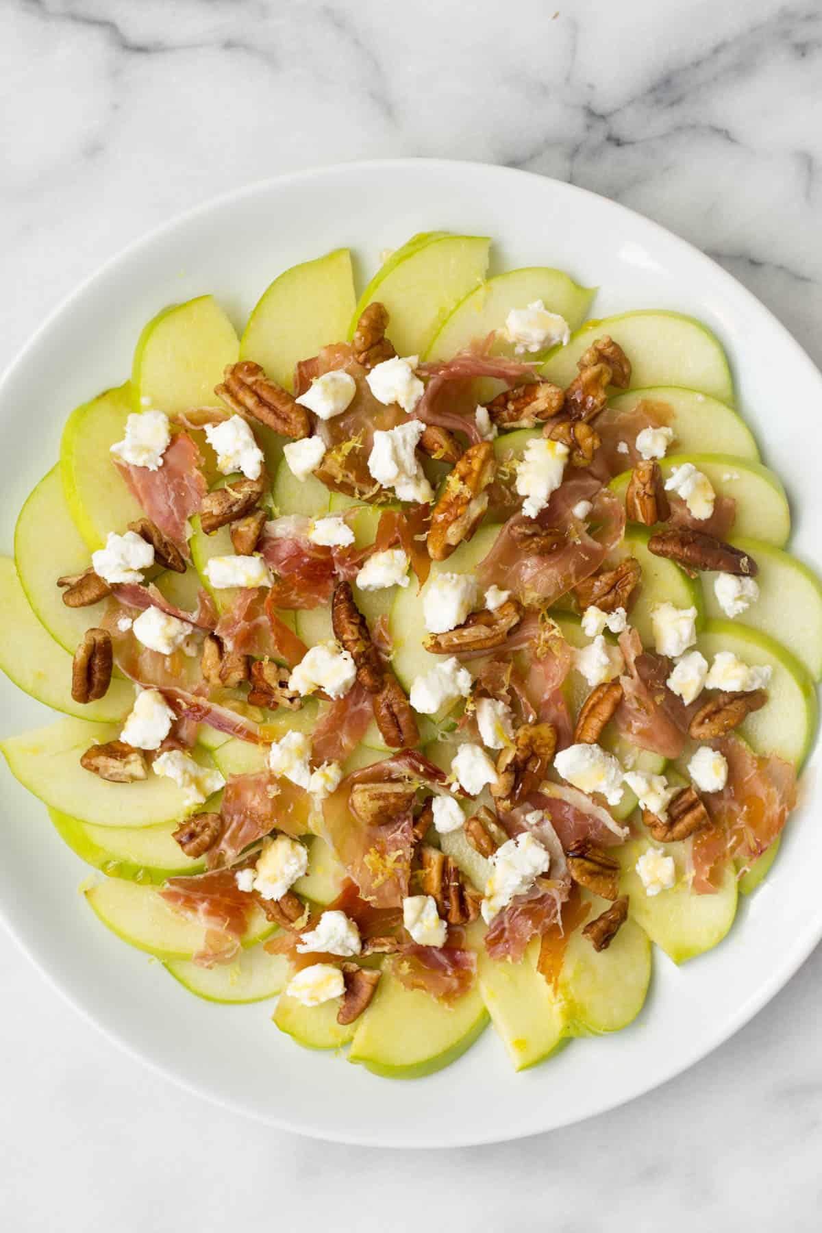 An easy fun fall recipe, these Savory Apple Nachos would be great for different occasions - an after school snack, a laid back get-together, and even a football tailgate! - Eat the Gains