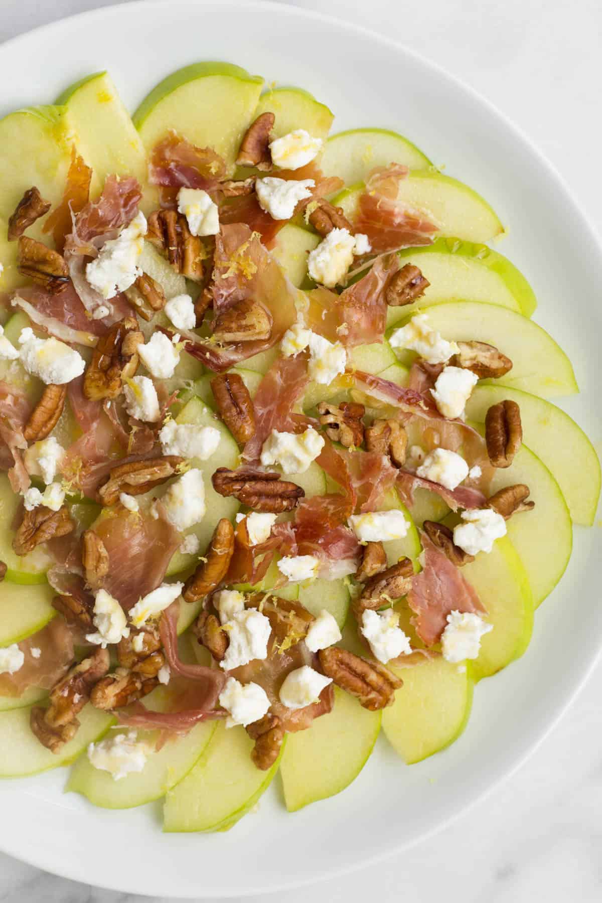 An easy fun fall recipe, these Savory Apple Nachos would be great for different occasions - an after school snack, a laid back get-together, and even a football tailgate! - Eat the Gains