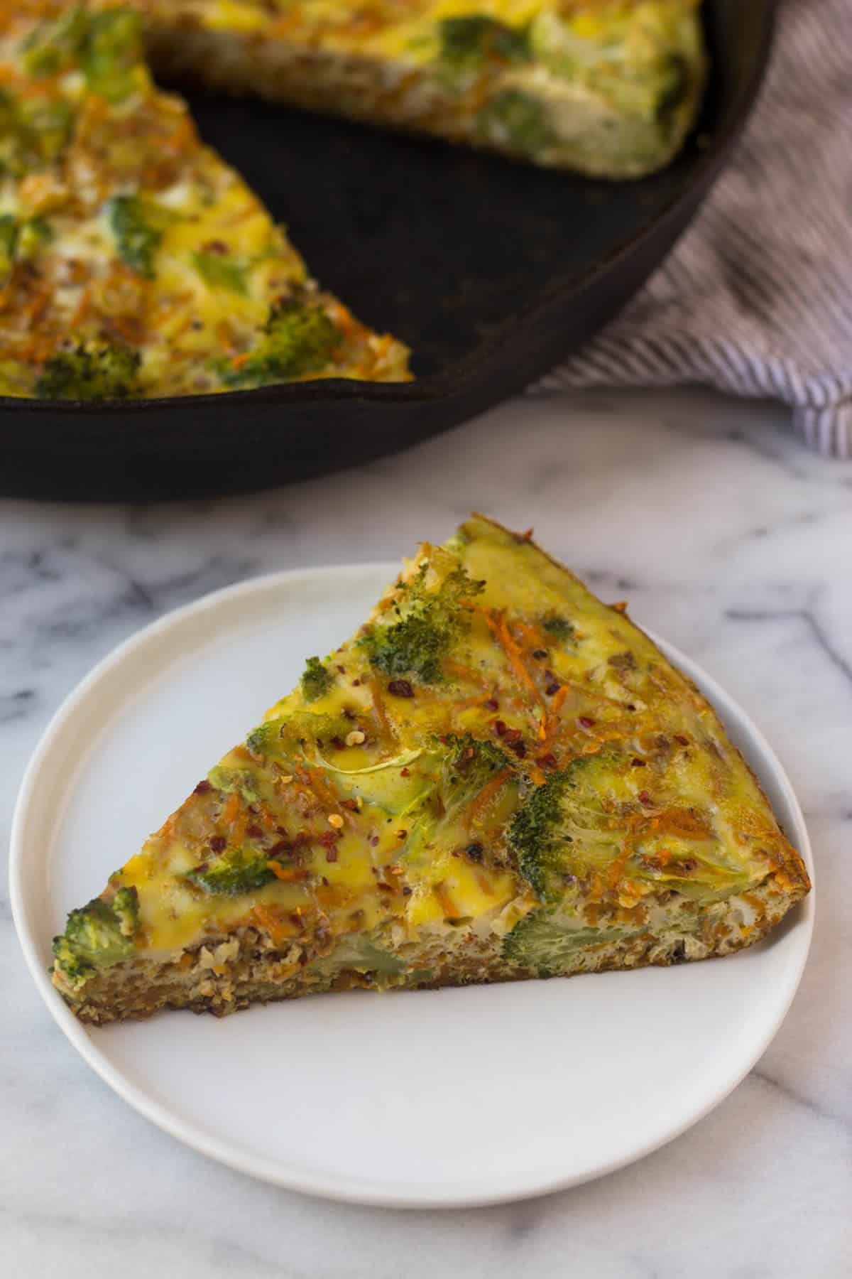 An easy and healthy breakfast, this Sweet Potato Broccoli Frittata packs veggies, carbs, protein, and healthy fats and is paleo and Whole30 approved! - Eat the Gains
