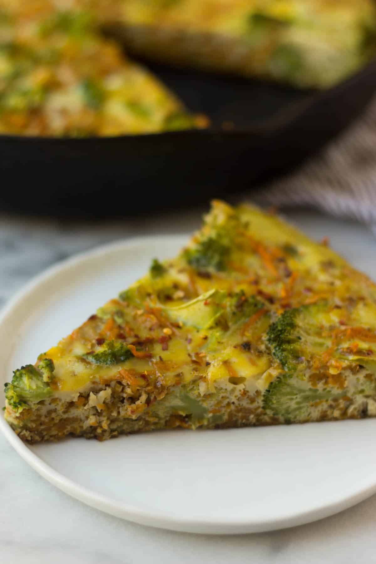 An easy and healthy breakfast, this Sweet Potato Broccoli Frittata packs veggies, carbs, protein, and healthy fats and is paleo and Whole30 approved! - Eat the Gains