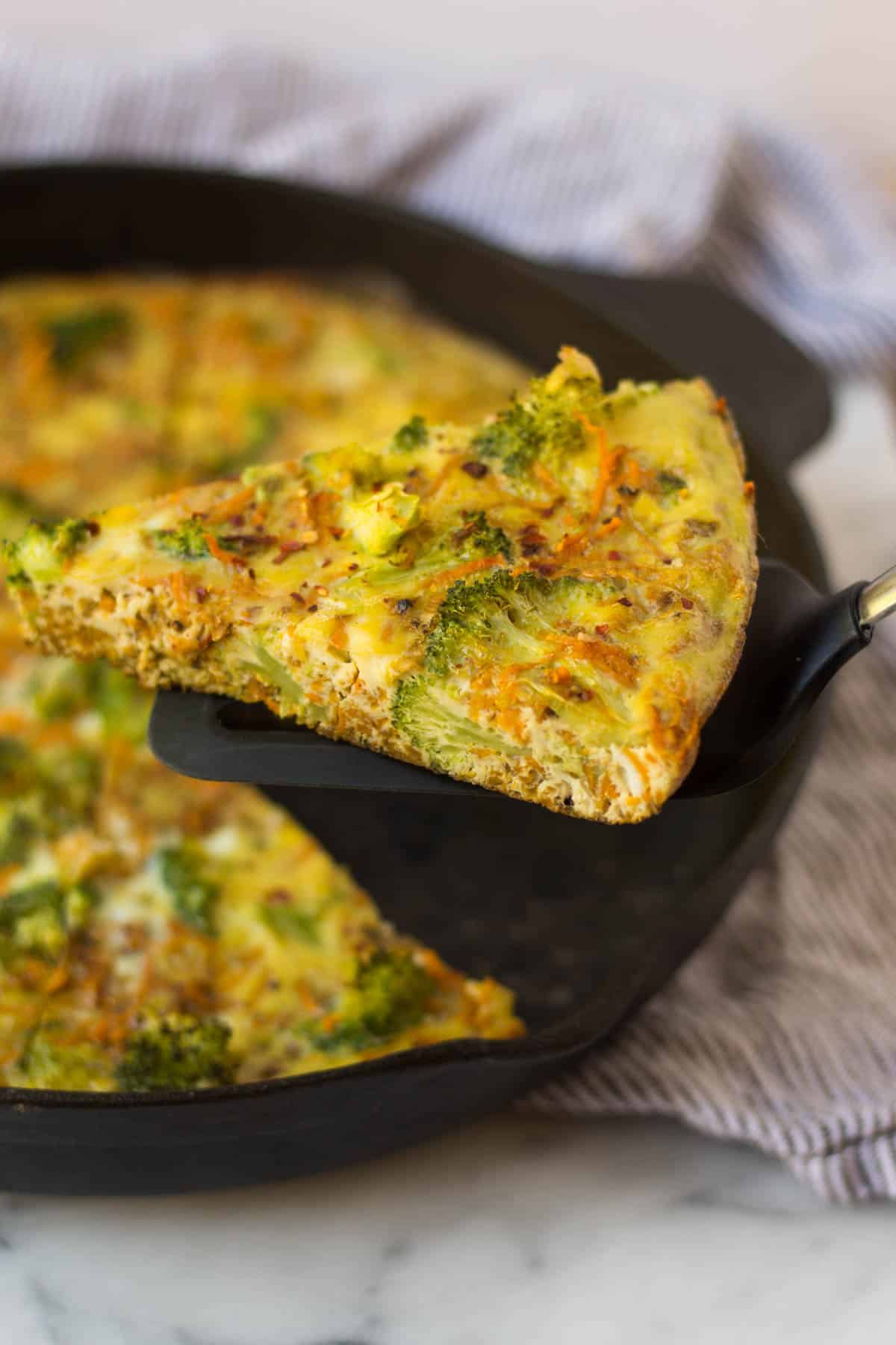 An easy and healthy breakfast, this Sweet Potato Broccoli Frittata packs veggies, carbs, protein, and healthy fats and is paleo and Whole30 approved! - Eat the Gains