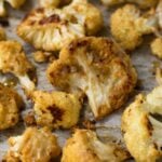 This vegan and paleo Maple Tahini Roasted Cauliflower make for an easy sweet and savory side dish - Eat the Gains