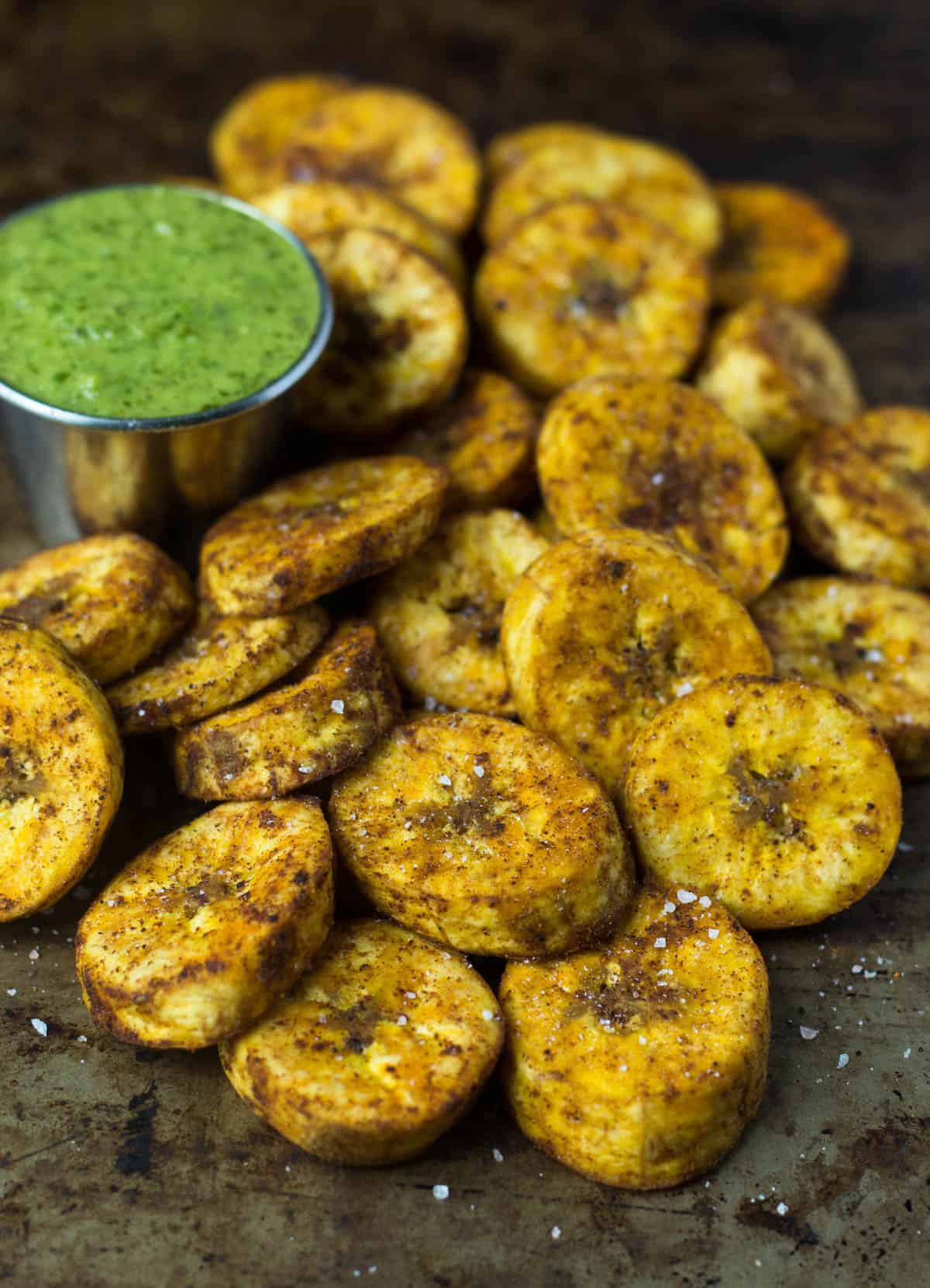 A great carb source, these Sweet & Spicy Baked Plantains are an easy side for breakfast or dinner and are paleo, vegan, and Whole30 approved! - Eat the Gains