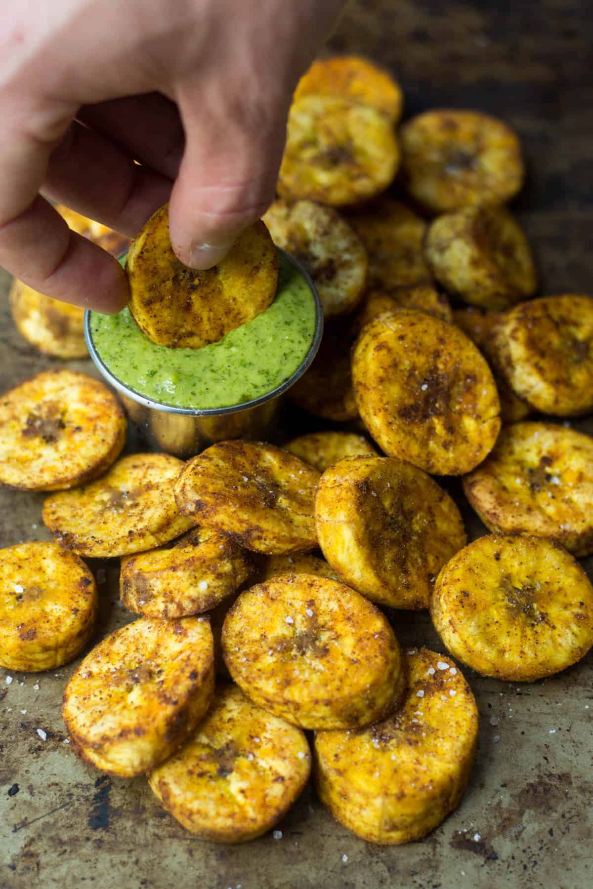 A great carb source, these Sweet & Spicy Baked Plantains are an easy side for breakfast or dinner and are paleo, vegan, and Whole30 approved! - Eat the Gains