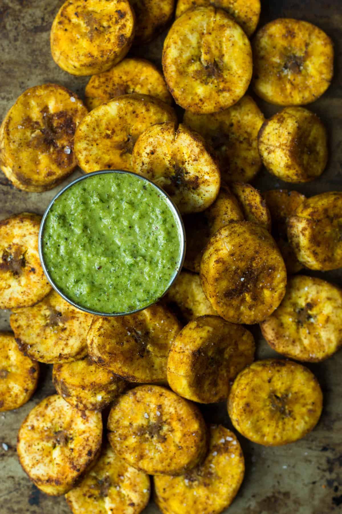 A great carb source, these Sweet & Spicy Baked Plantains are an easy side for breakfast or dinner and are paleo, vegan, and Whole30 approved! - Eat the Gains