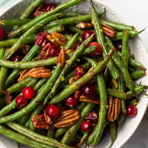 These super easy Paleo Holiday Green Beans come together in less than 10 minutes and make the perfect side to your main course - paleo, vegan, and Whole30 approved too! - Eat the Gains