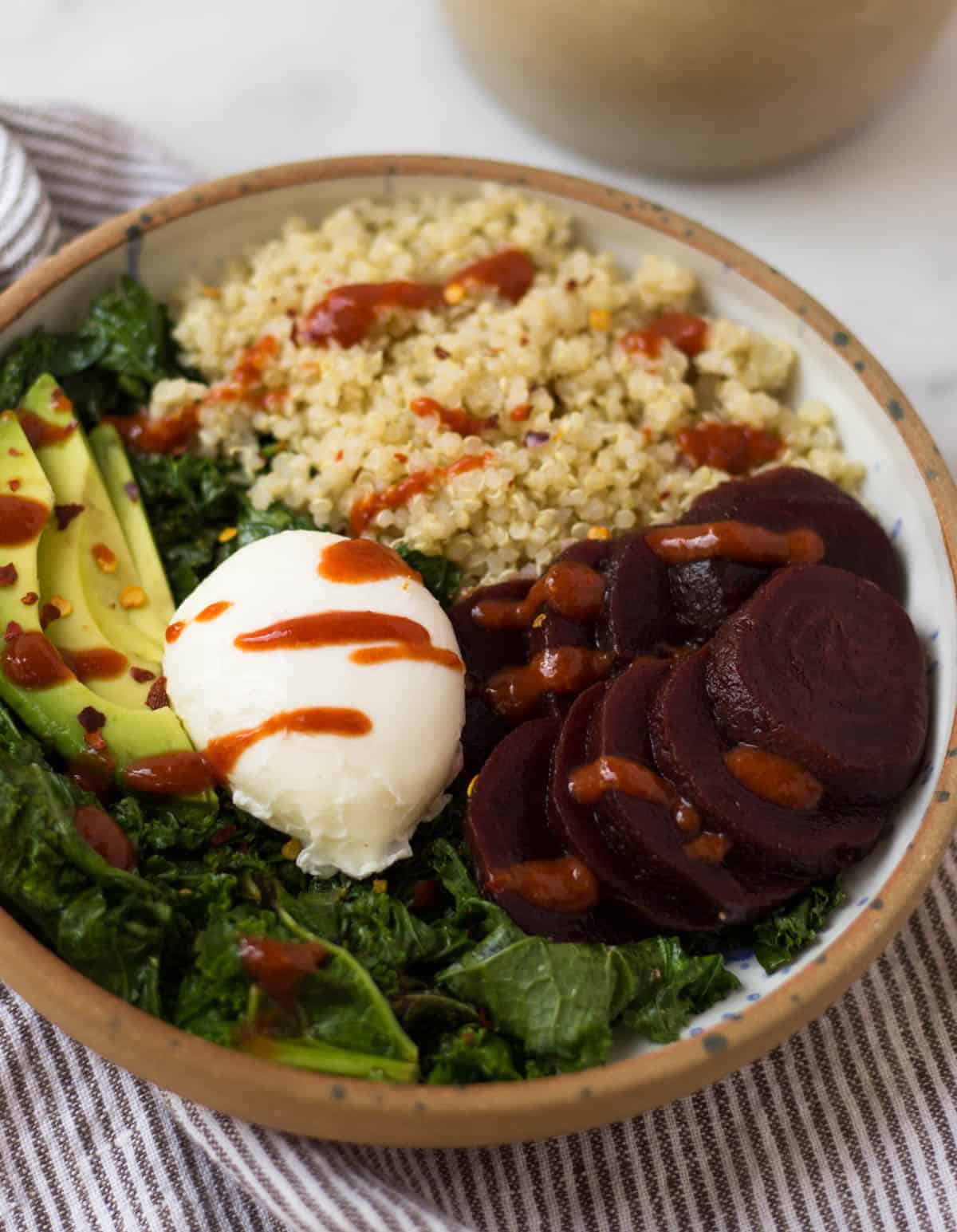 Beet Quinoa Breakfast Bowls come together in under 10 mins and make a healthy and easy gluten free and vegetarian breakfast - great for meal prep or on-the-go! - Eat the Gains