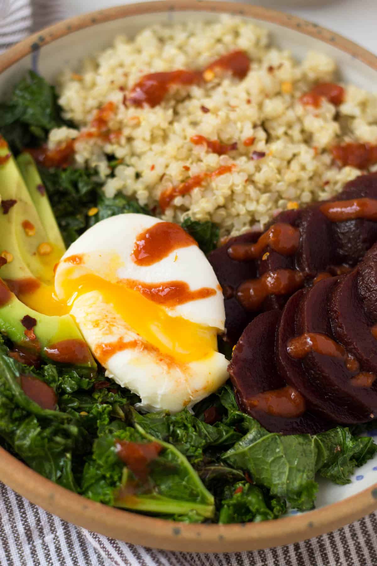 Beet Quinoa Breakfast Bowls come together in under 10 mins and make a healthy and easy gluten free and vegetarian breakfast - great for meal prep or on-the-go! - Eat the Gains