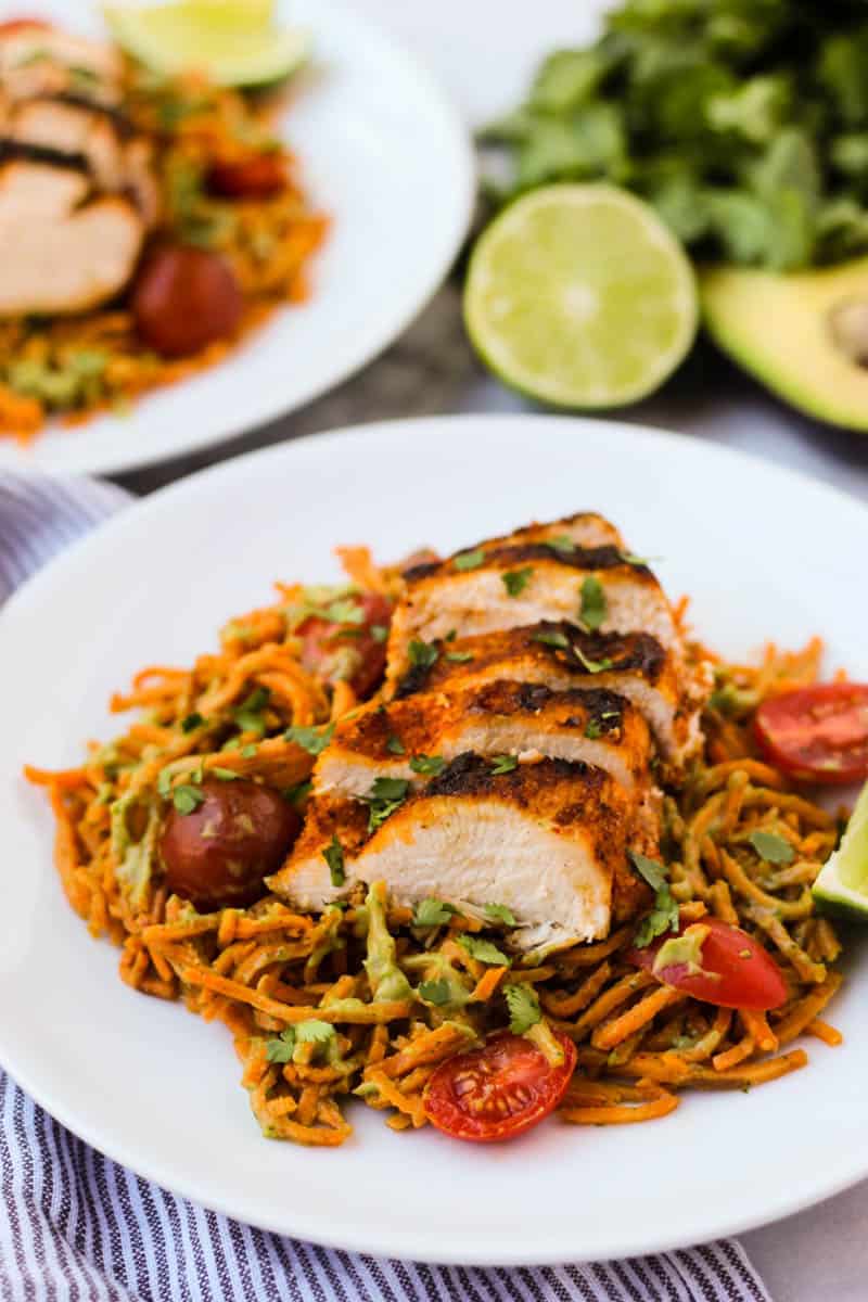 One pan & 30 minutes for this Chili Dusted Chicken & Sweet Potato Noodles with Avocado Sauce. Packed with protein, carbs, and healthy fats to make an easy gluten free, paleo, and Whole30 approved dish - Eat the Gains