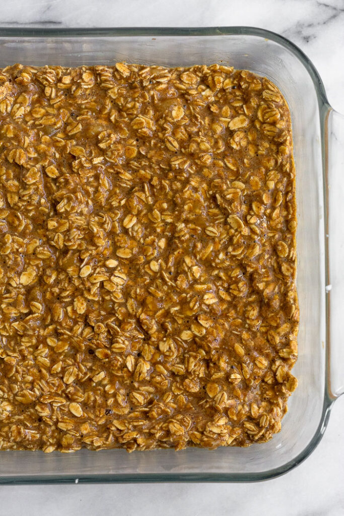 Large baking dish filled with baked oatmeal before it is baked.