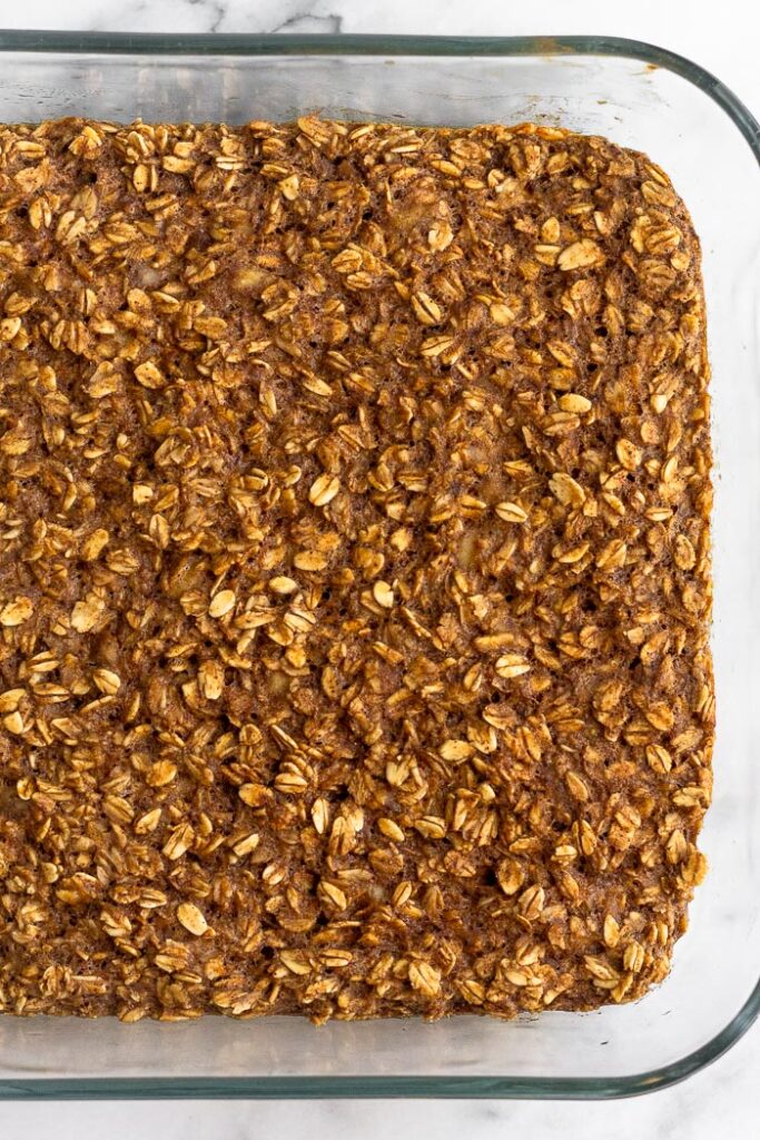 Large glass dish of baked gingerbread oatmeal.