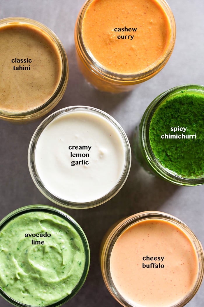 Overhead shot of 6 whole30 sauces in different jars with text overtop each one explaining what they are.