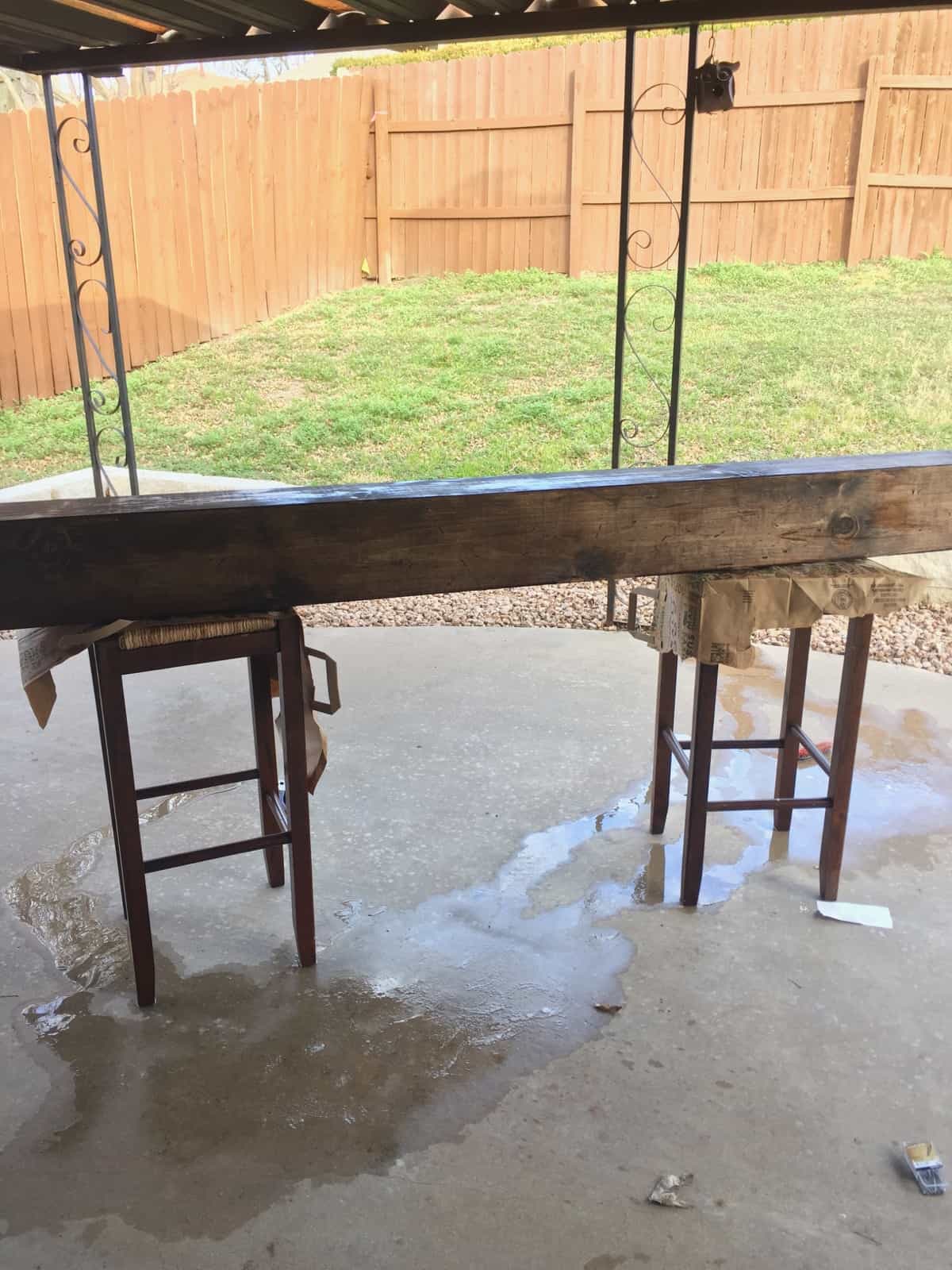 Freshly painted mantel sitting outside letting it air dry