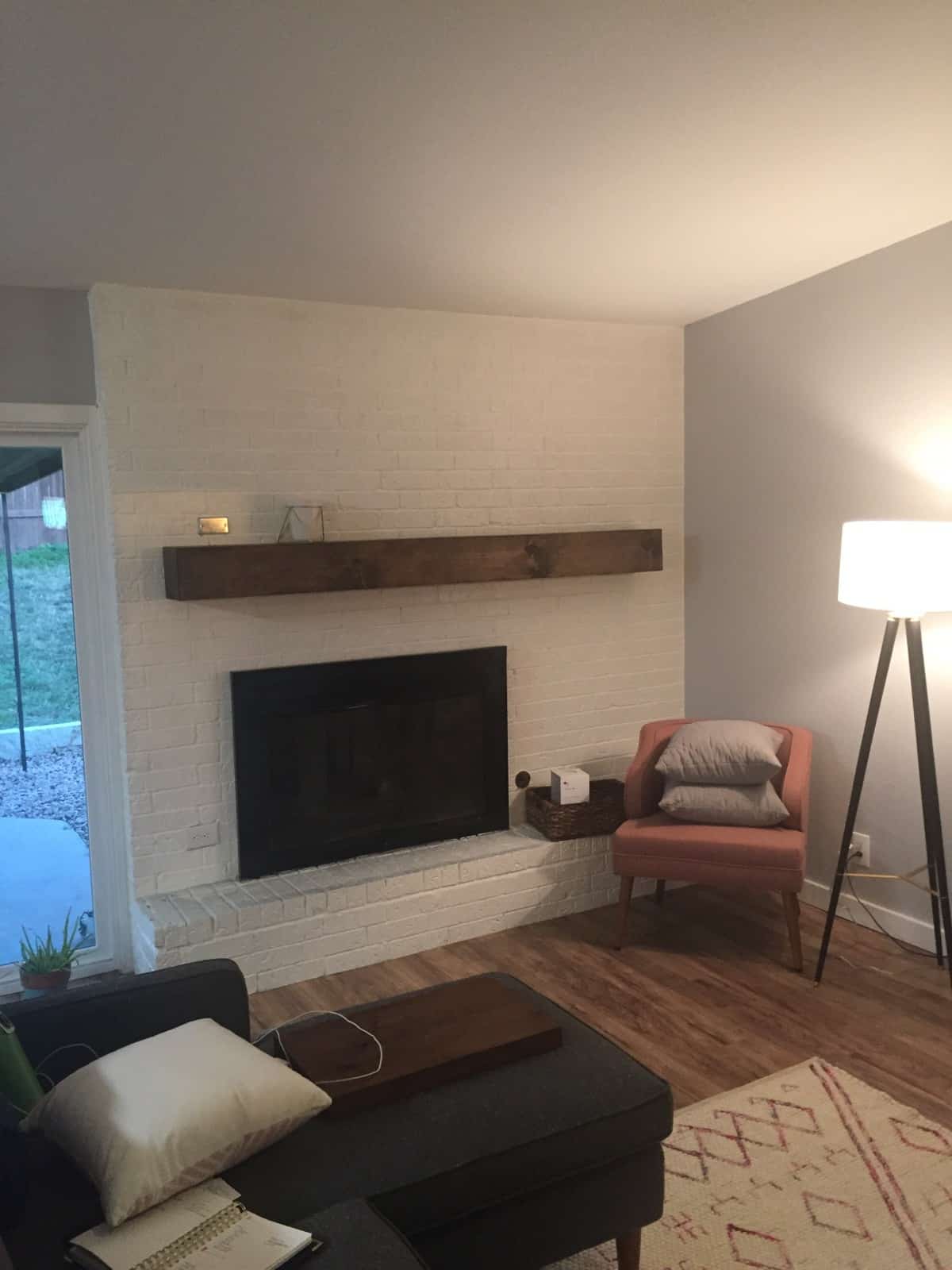 homemade mantel hung over the fire place