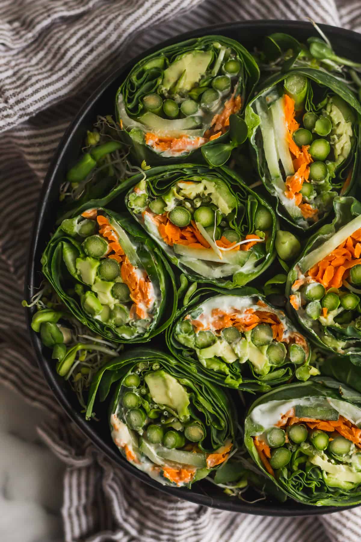Large bowl filled with veggie collard wraps