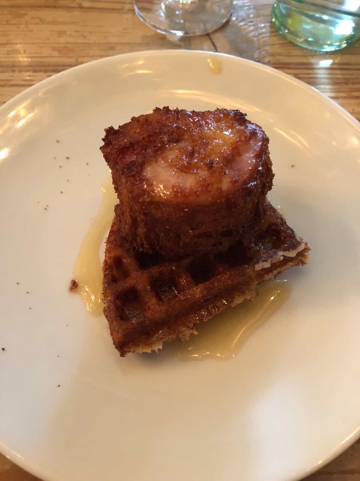 Waffle topped with fried chicken