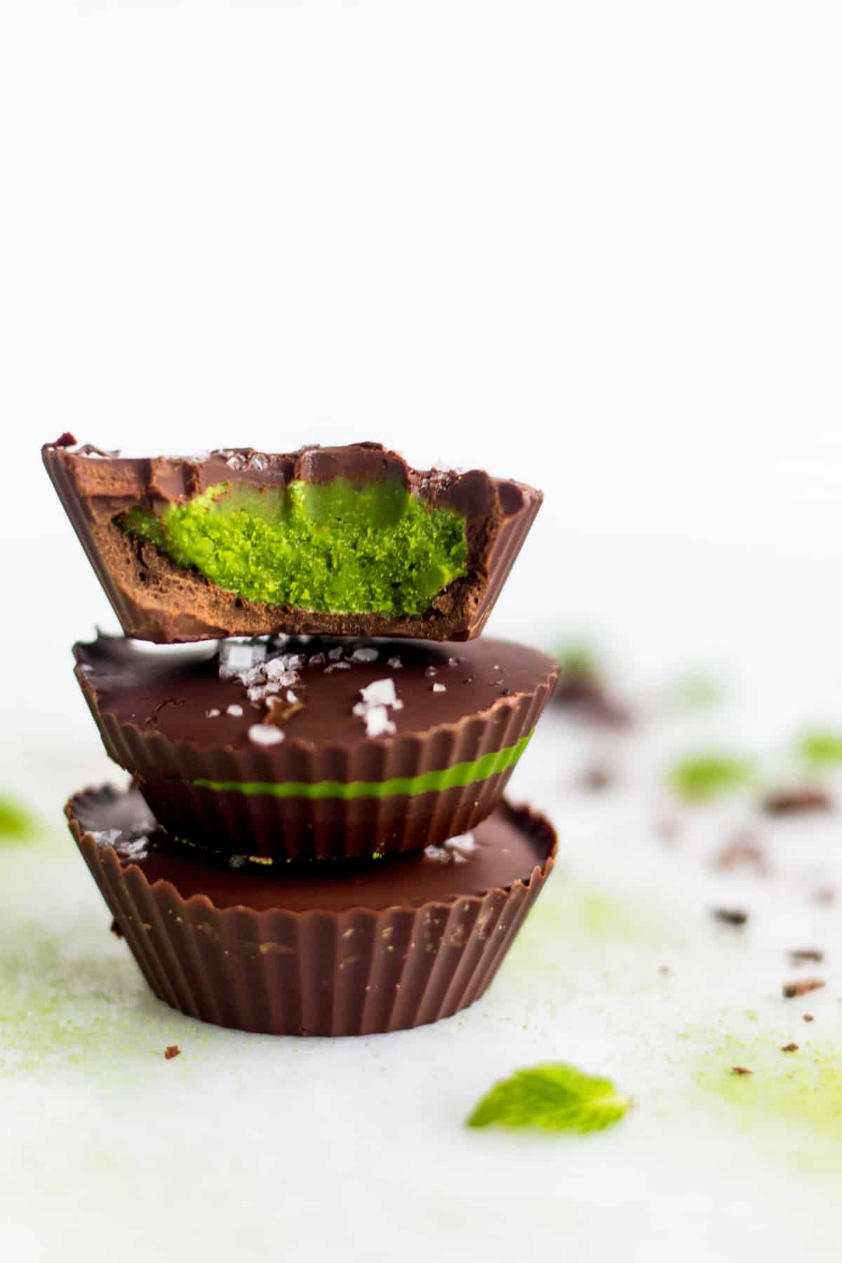 3 Collagen Mint Matcha Coconut Butter Cups stacked on top of each other