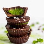 A stack of 4 Collagen Mint Matcha Coconut Butter Cups