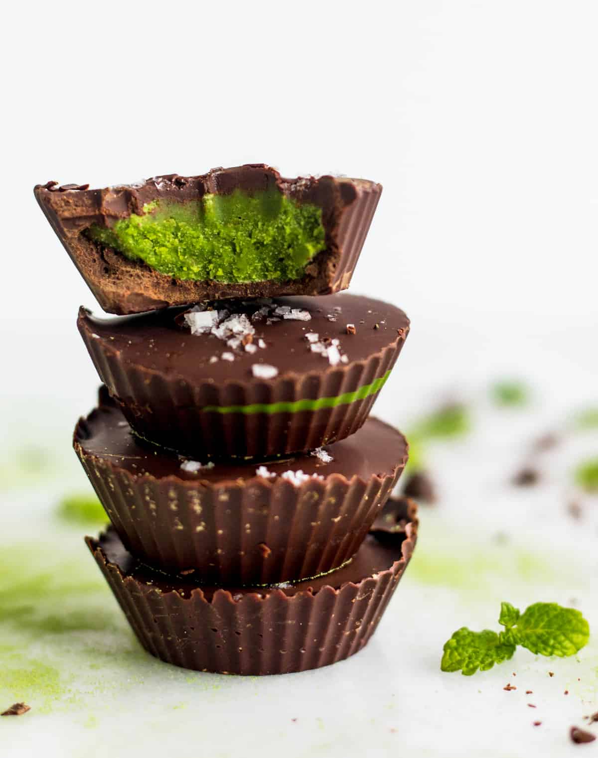A stack of 4 Collagen Mint Matcha Coconut Butter Cups