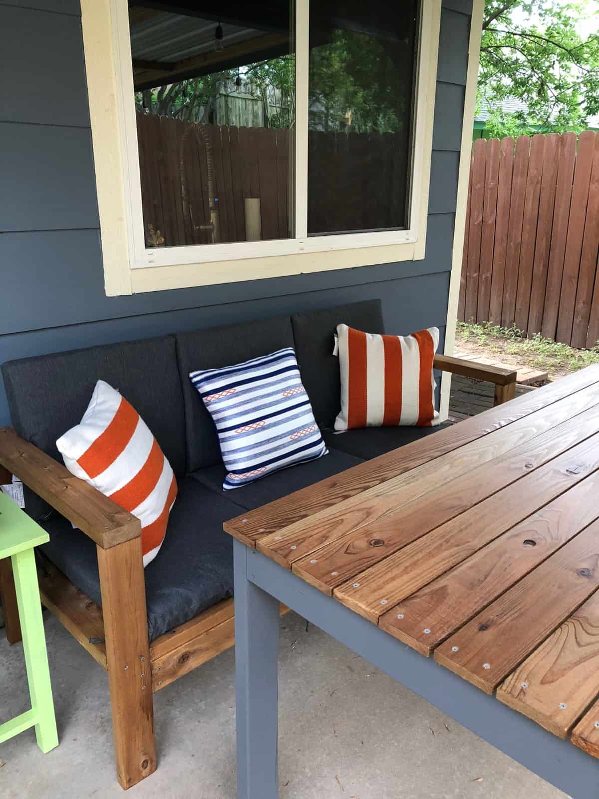 DIY wooden table and couch on a patio