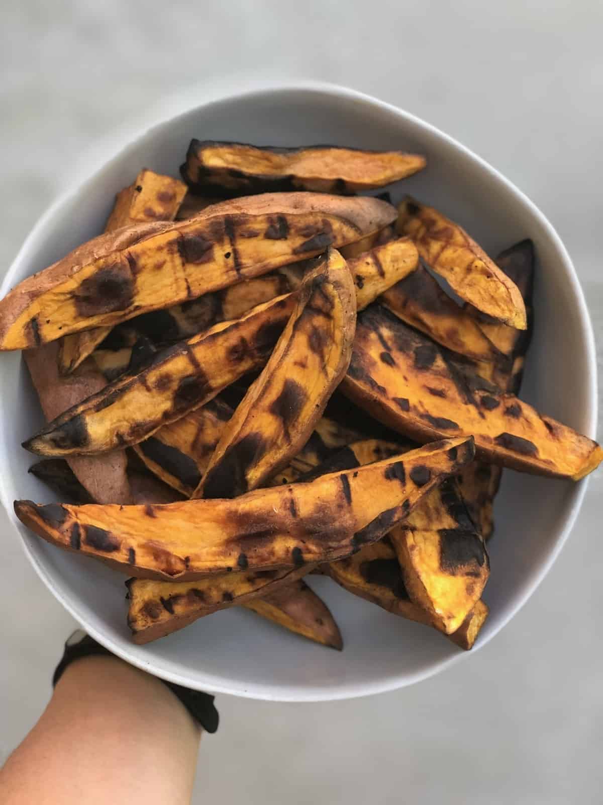 Big bowl of grilled sweet potato fries