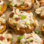 Whole30 pizza on sweet potato rounds with chicken, bacon, and ranch on top.