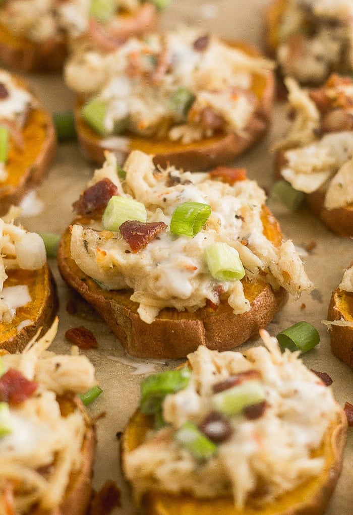 Whole30 pizza on sweet potato rounds with chicken, bacon, and ranch on top.