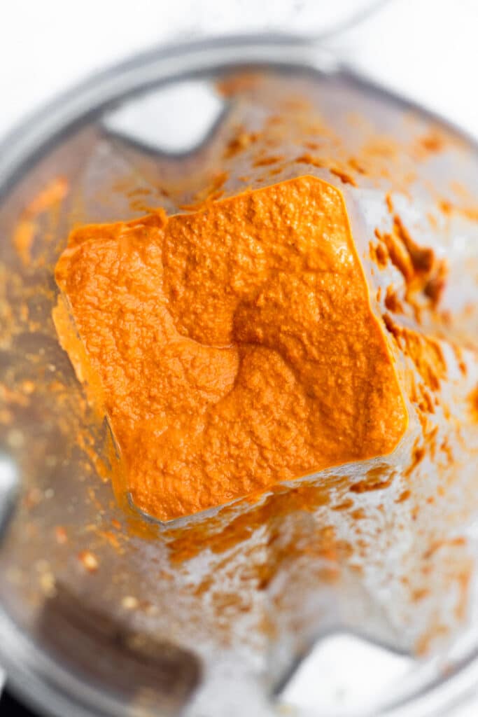 Blender filled with sun dried tomato pasta sauce