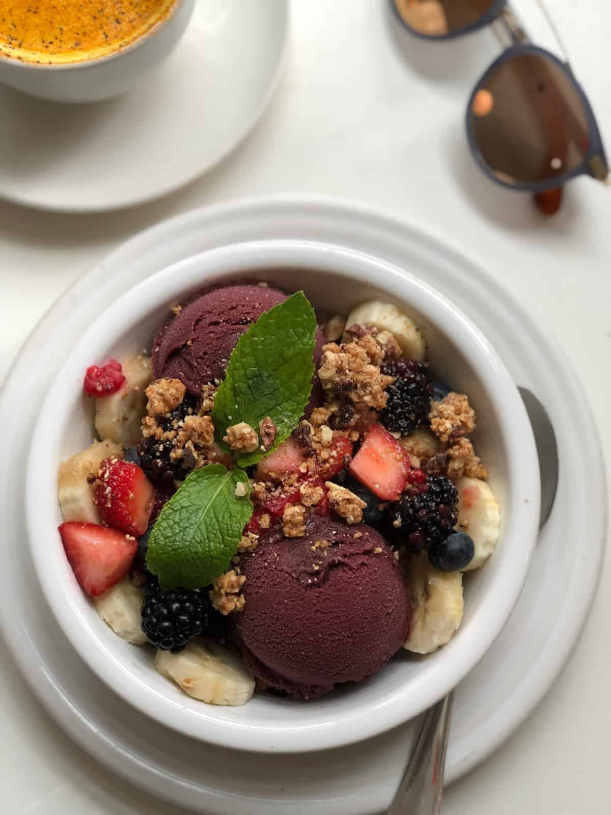 Acai bowl with acai, fresh fruit, granola, and mint from Cafe Gratitude 