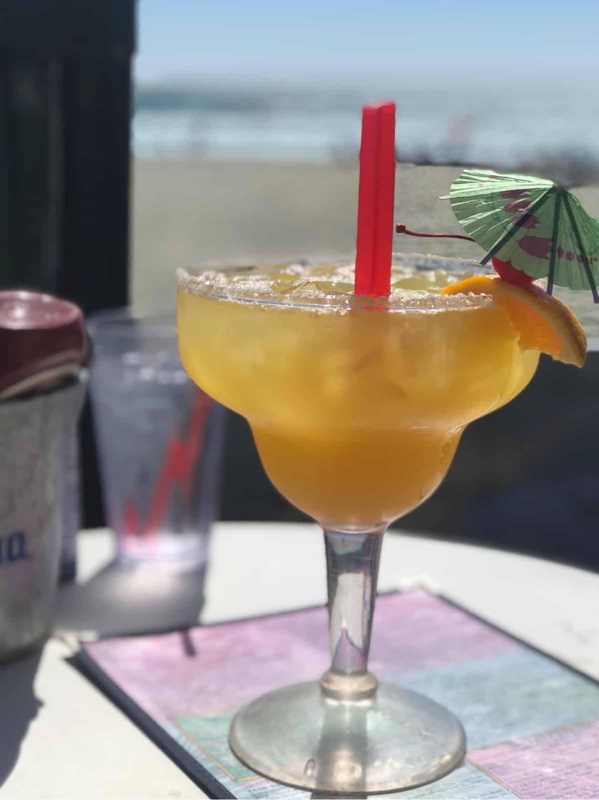 Huge mango margarita in a margarita class on the beach in San Diego