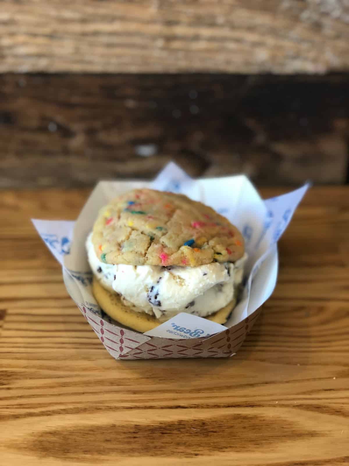Ice cream cookie sandwich with funfetti cookies and chocolate chip cookie dough ice cream from Baked Bear in San Diego, CA