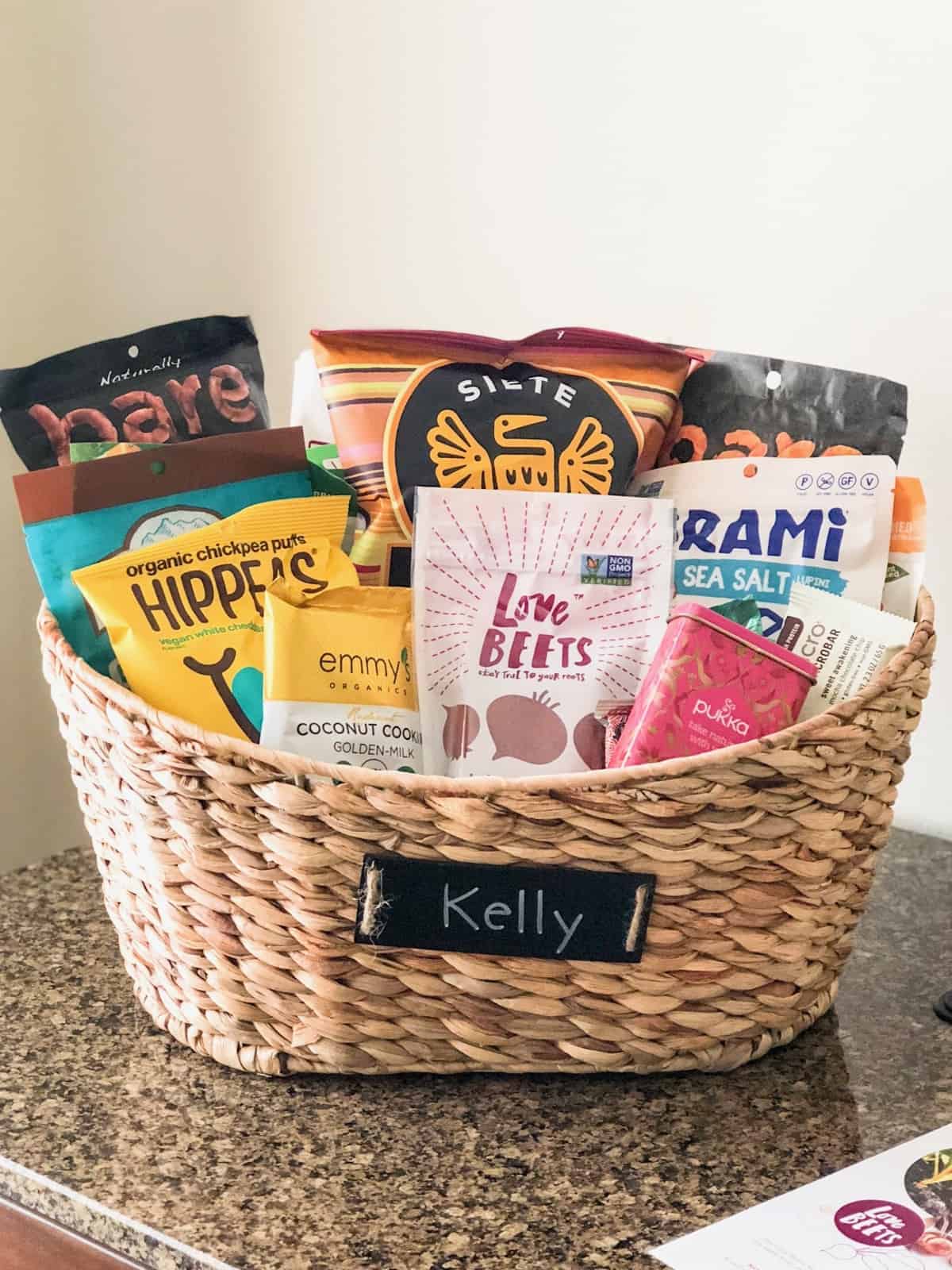 Large wooden basket full of snacks