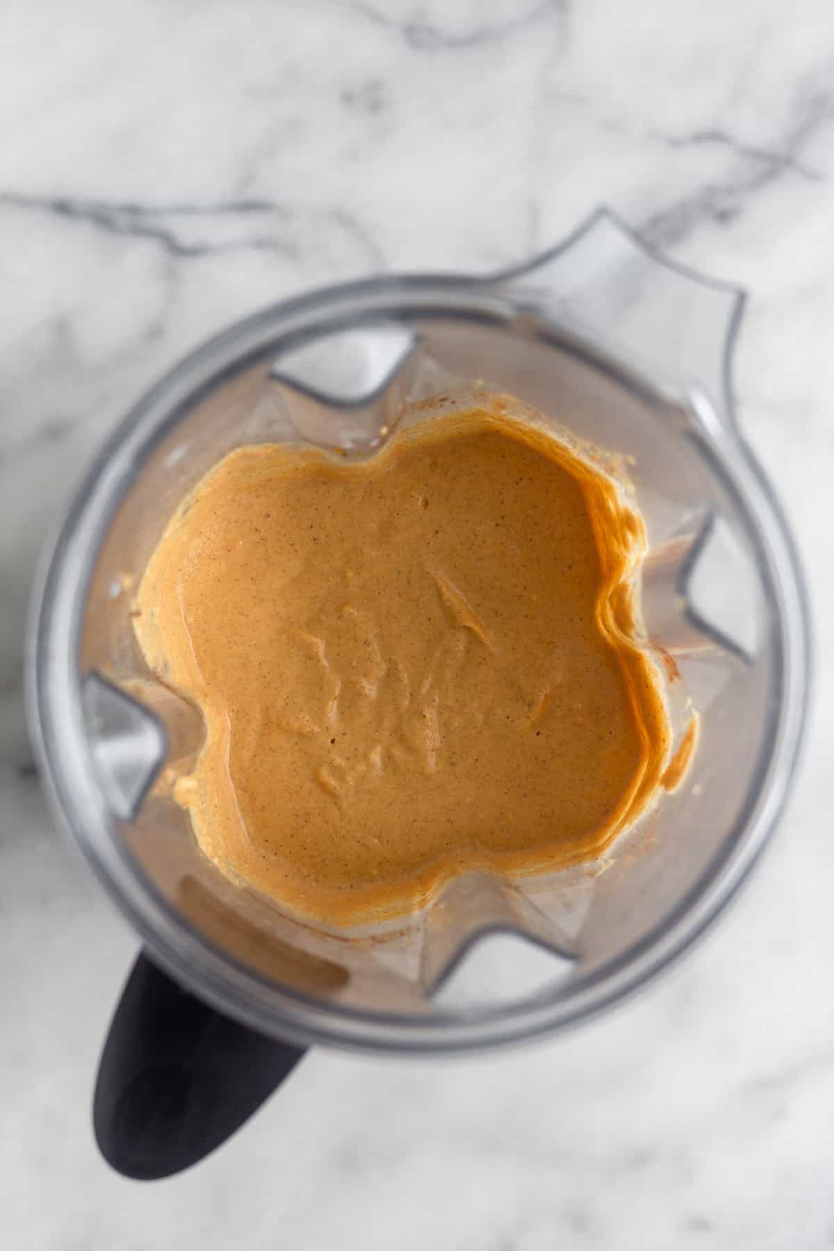 Blender with the blended up mixture for paleo pumpkin ice cream